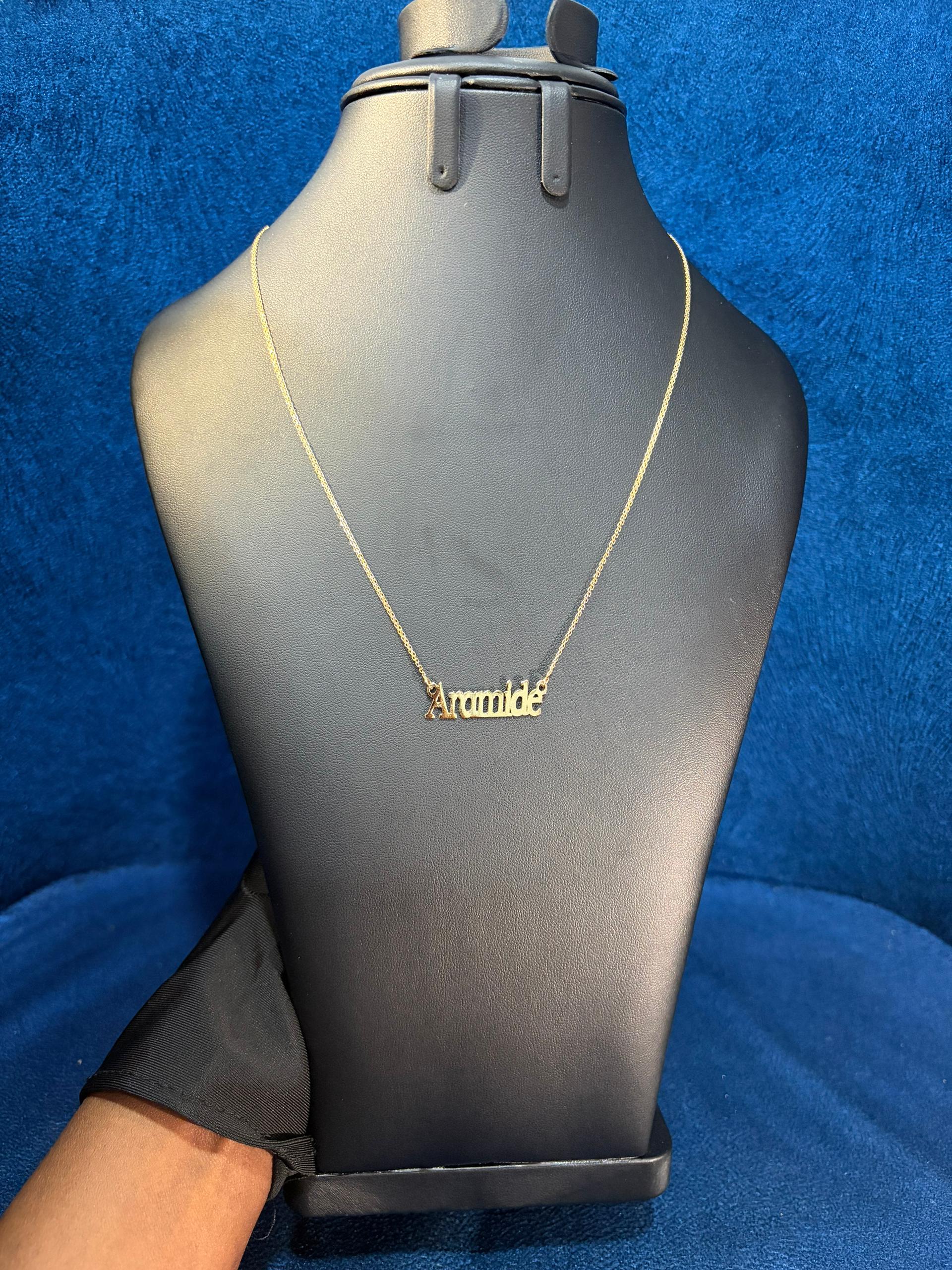 Aramide custom necklace worn on display